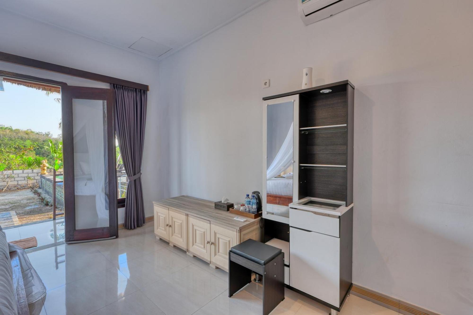 Mt Penida Bungalow Sakti Номер фото